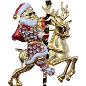 Brooch gold tone pin 2.5” enamel rhinestone Christmas Santa on carousel